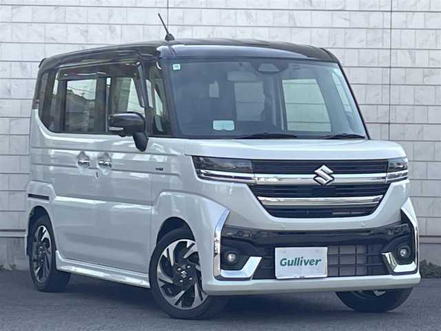 スズキ スペーシア カスタム HYBRID XS 大分県 2024(令6)年 0.5万km ピュアホワイトパール/ブラック2トーン ワンオーナー/ハーフレザー調シート/メーカーOPナビ 【フルセグ/BTオーディオ】/全方位カメラ/両側パワースライドドア/純正15インチアルミホイール/レーダークルーズコントロール/クリアランスソナー/シーケンシャルウインカー/前後ドライブレコーダー/ビルトインETC/ヘッドアップディスプレイ/電動パーキングブレーキ/充電用USBソケット/後席サーキュレーター/後席オットマン/LEDヘッドライト/LEDフォグランプ/オートライト/レザーステアリング/ステアリングヒーター/ステアリングリモコン/チルトステアリング/前席シートヒーター/ウインカーミラー/横滑り防止装置/アイドリングストップ/リアプライバシーガラス/エンジンプッシュスタート/ヘッドライトレベライザー/ドアバイザー/電動格納ミラー/サイド&Wエアバッグ/ABS/スマートキー×2/保証書/車両取説/ナビ取説