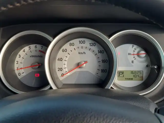 日産 ティーダ アクシス 黒本革 東京都 2008(平20)年 1.7万km ブリリアントシルバー 黒レザーシート/純正ナビ/バック＆左サイドカメラ/ETC/オートライト/電動格納ドアミラー/リモコンキー/15インチAUTECHアルミホイール