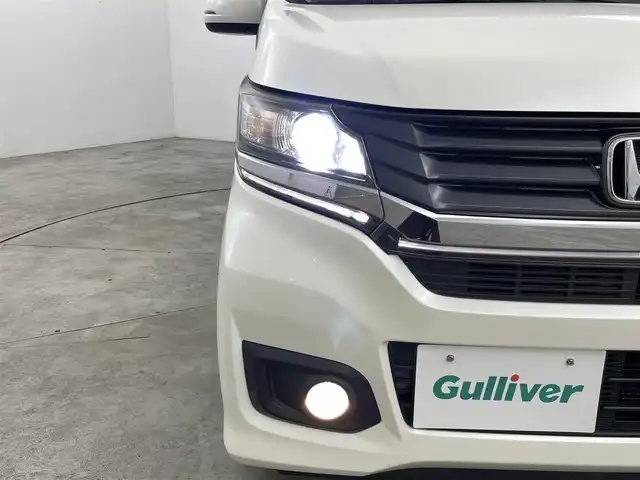 ホンダ Ｎ ＷＧＮ カスタム G ターボパッケージ 福島県 2015(平27)年 7.5万km プレミアムホワイトパール 純正ナビゲーション/・型番：VXM-155VSi/・フルセグTV/BT/CD/DVD/USB/SD/FM/AM/・バックカメラ/・ETC/・前後ドライブレコーダー/革張ステアリング/・ステアリングリモコン/・パドルシフト/・クルーズコントロール/衝突被害軽減ブレーキ/ハーフレザーシート/アイドリングストップ/プッシュスタート/・スマートキー/電動格納ミラー/・ウィンカーミラー/LEDヘッドライト/・フォグライト/・オートライト/純正フロアマット/ドアバイザー/純正14インチAW