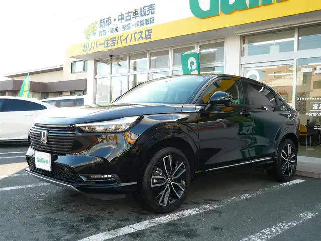 ホンダ ヴェゼル ハイブリッド e:HEV Z 静岡県 2024(令6)年 1.7万km クリスタルブラックパール ワンオーナー/禁煙車/ホンダセンシング/・衝突軽減ブレーキ/・後方誤発進抑制機能/・歩行者事故軽減ステアリング/・車線維持支援システム/・標識認識機能/・アダクティブクルーズコントロール/・オートハイビーム/・アクティブコーナリングライト/・ブラインドスポットモニター/Gathers9インチナビ/バックカメラ/フルセグテレビ/Bluetooth/DVD再生/Music Rack/ハーフレザーシート/シートヒーター/ステアリングヒーター/パワーバックドア/スマートキー/フロアマット/ETC/新車保証書/取扱説明書