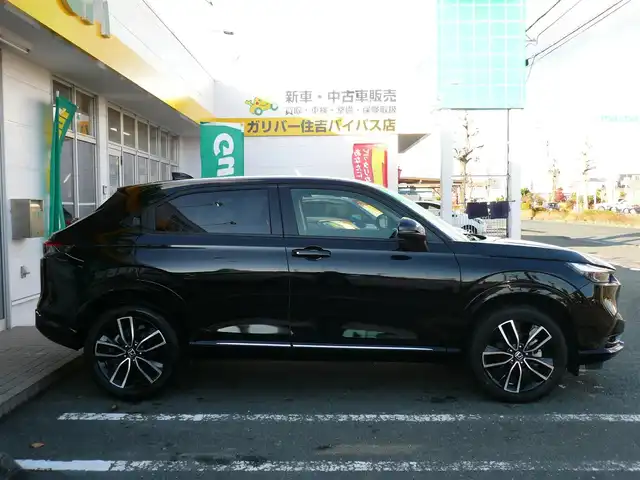 ホンダ ヴェゼル ハイブリッド e:HEV Z 静岡県 2024(令6)年 1.7万km クリスタルブラックパール ワンオーナー/禁煙車/ホンダセンシング/・衝突軽減ブレーキ/・後方誤発進抑制機能/・歩行者事故軽減ステアリング/・車線維持支援システム/・標識認識機能/・アダクティブクルーズコントロール/・オートハイビーム/・アクティブコーナリングライト/・ブラインドスポットモニター/Gathers9インチナビ/バックカメラ/フルセグテレビ/Bluetooth/DVD再生/Music Rack/ハーフレザーシート/シートヒーター/ステアリングヒーター/パワーバックドア/スマートキー/フロアマット/ETC/新車保証書/取扱説明書