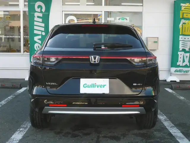 ホンダ ヴェゼル ハイブリッド e:HEV Z 静岡県 2024(令6)年 1.7万km クリスタルブラックパール ワンオーナー/禁煙車/ホンダセンシング/・衝突軽減ブレーキ/・後方誤発進抑制機能/・歩行者事故軽減ステアリング/・車線維持支援システム/・標識認識機能/・アダクティブクルーズコントロール/・オートハイビーム/・アクティブコーナリングライト/・ブラインドスポットモニター/Gathers9インチナビ/バックカメラ/フルセグテレビ/Bluetooth/DVD再生/Music Rack/ハーフレザーシート/シートヒーター/ステアリングヒーター/パワーバックドア/スマートキー/フロアマット/ETC/新車保証書/取扱説明書