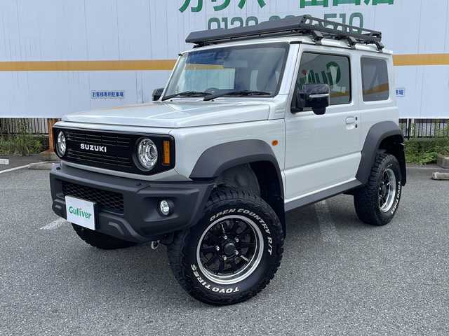 スズキ ジムニー シエラ JC 山口県 2024(令6)年 1.7万km ピュアホワイトP ワンオーナー/社外ディスプレイオーディオ(BT/USB/HDMI）/社外フロントカメラ/社外モニター/CLLINK 3インチリフトアップキット/CLLINK フロントグリル/CLLINK スクエアルーフラック/CLLINK リアゲートボックス/CLLINK ラダー/RAYS 16インチアルミホイール/純正LEDヘッドライト/純正フォグランプ/オートライト/社外マフラー/前席シートヒーター/革巻きステアリング/ステアリングスイッチ/クルーズコントロール/DAC/クリアフューエルリッドカバー/社外ボンネットダンパー/衝突被害軽減ブレーキ/LKA/横滑り防止/コーナーセンサー/アイドリングストップ/スマートキー/社外フロアマット/ETC/電動格納ウインカードアミラー