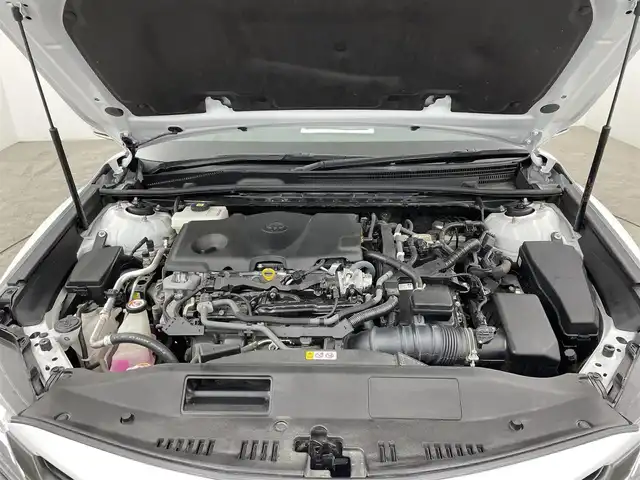 トヨタ カムリ WSレザーパッケージ 大分県 2021(令3)年 7万km プラチナホワイトパールマイカ ワンオーナー/GRエアロ（F、S、R）/TRDマフラー/TOYOTAセーフティセンス/・プリクラッシュセーフティ/・レーントレーシングアシスト/・レーダークルーズコントロール/・オートマチックハイビーム/ブラインドスポットモニター/リアクロストラフィックアラート/ヘッドアップディスプレイ/JBLサウンドシステム/9型ディスプレイオーディオ/・ナビ機能有り、フルセグTV、USB/・CD/DVD、BT対応/・AppleCarPlay、AndroidAuto/ステアリングスイッチ/バックカメラ/黒革シート/・前席パワーシート/前席シートヒーター/ビルトインETC/社外ドライブレコーダー（前、後、車内）/横滑り防止装置/電動格納ミラー/純正フロアマット/オートライト/LEDヘッドライト/LEDフォグ/純正18インチアルミホイール/クリアランスソナー /保証書、取説、スペアキー