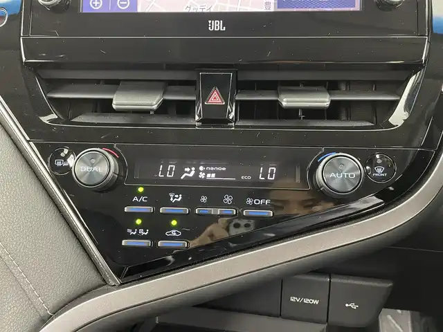トヨタ カムリ WSレザーパッケージ 大分県 2021(令3)年 7万km プラチナホワイトパールマイカ ワンオーナー/GRエアロ（F、S、R）/TRDマフラー/TOYOTAセーフティセンス/・プリクラッシュセーフティ/・レーントレーシングアシスト/・レーダークルーズコントロール/・オートマチックハイビーム/ブラインドスポットモニター/リアクロストラフィックアラート/ヘッドアップディスプレイ/JBLサウンドシステム/9型ディスプレイオーディオ/・ナビ機能有り、フルセグTV、USB/・CD/DVD、BT対応/・AppleCarPlay、AndroidAuto/ステアリングスイッチ/バックカメラ/黒革シート/・前席パワーシート/前席シートヒーター/ビルトインETC/社外ドライブレコーダー（前、後、車内）/横滑り防止装置/電動格納ミラー/純正フロアマット/オートライト/LEDヘッドライト/LEDフォグ/純正18インチアルミホイール/クリアランスソナー /保証書、取説、スペアキー