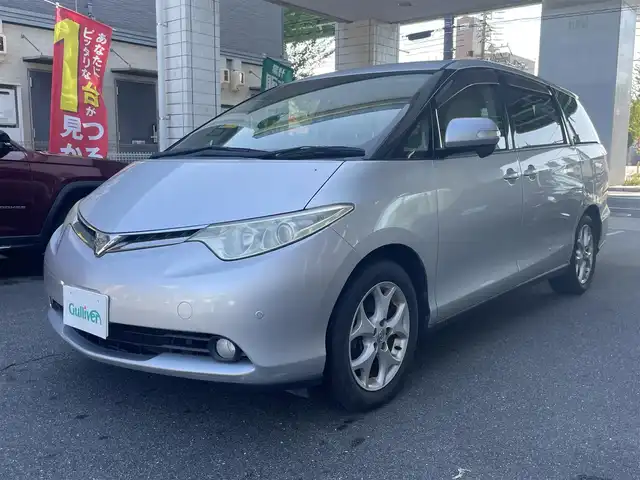 トヨタ エスティマ G 愛知県 2007(平19)年 10.9万km シルバーM ワンオーナー/両側パワースライドドア/Carrozzeria製HDDナビ〈AVIC-HRZ88〉/DVD／MS／地デジTV/バックカメラ/運転席パワーシート/アンテナ分離型ETC/インテリジェントAFS付HIDヘッドライト/純正フォグランプ/2列目リラックスキャプテンシート〈オットマン付〉/３列目荷室下格納/純正17インチAW/スマートキー＆プッシュスタート