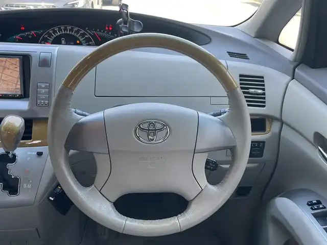 トヨタ エスティマ G 愛知県 2007(平19)年 10.9万km シルバーM ワンオーナー/両側パワースライドドア/Carrozzeria製HDDナビ〈AVIC-HRZ88〉/DVD／MS／地デジTV/バックカメラ/運転席パワーシート/アンテナ分離型ETC/インテリジェントAFS付HIDヘッドライト/純正フォグランプ/2列目リラックスキャプテンシート〈オットマン付〉/３列目荷室下格納/純正17インチAW/スマートキー＆プッシュスタート