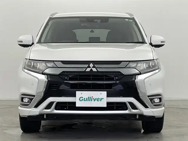 三菱 アウトランダー ＰＨＥＶ G 群馬県 2019(平31)年 6.4万km シルキーホワイト 後側方車両検知警報システム/＝＝＝＝＝/マルチアラウンドビューモニター/KENWOOD７インチナビ/・AM/FM/CD/DVD/Bluetooth/フルセグTV/KENWOODサブウーファー/KENWOODスピーカー/e-Assist/・衝突被害軽減ブレーキシステム/・車線逸脱警報システム/・オートマチックハイビーム/・レーダークルーズコントロールシステム/パーキングセンサー/後側方車両検知警報システム/ステアリングヒーター/前席シートヒーター/前後ドライブレコーダー/パドルシフト/ＬＥＤヘッドライト/オートライト/電動パーキングブレーキ/オートブレーキホールド/ＡＣ１００Ｖ電源/社外レーダー