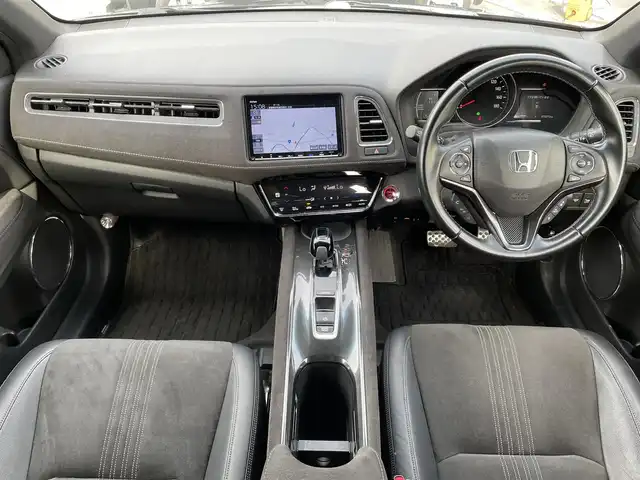 ホンダ ヴェゼル ハイブリッド RS ホンダセンシング 愛媛県 2018(平30)年 7.3万km クリスタルブラックパール 純正ディーラーナビ（VXM-187VFEi）/フルセグTV/Bluetooth/CD/DVD/バックカメラ/ホンダセンシング/-衝突軽減ブレーキ/-アダプティブクルーズコントロール/-車線維持システム/-パーキングセンサーシステム/ビルトインETC/純正ドライブレコーダー/ハーフレザーシート/前席シートヒーター/電動パーキングブレーキ/オートブレーキホールド/純正18インチアルミホイール/純正フロアマット/取扱説明書/保証書/スペアキー