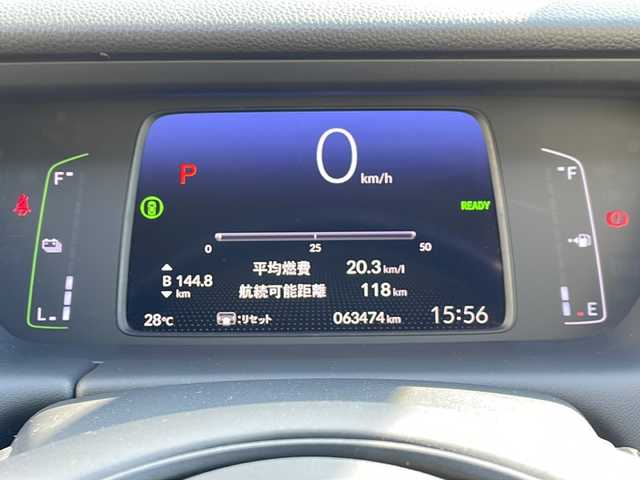 ホンダ フィット e:HEVホーム 山形県 2020(令2)年 6.4万km プラチナホワイトパール 禁煙車/ワンオーナー/Honda SENSING/・衝突軽減ブレーキ（ＣＭＢＳ）/・路外逸脱抑制機能/・先行車発進お知らせ機能/・アダプティブクルーズコントロール（ＡＣＣ）/・車線維持支援システム（ＬＫＡＳ）/・標識認識機能/・誤発進抑制機能 /・近距離衝突軽減ブレーキ/・オートハイビーム/・パーキングセンサーシステム/ハーフレザーシート/純正ナビ(CD.DVD.BT.USB.SD)/バックカメラ/フルセグ/ETC/ワイパーデアイサー/ミラーヒーター/LEDヘッドライト/プッシュスタート/スマートキーｘ２/ヘッドライトレベライザー/スタッドレスタイヤ積込み/電動パーキング/オートホールド