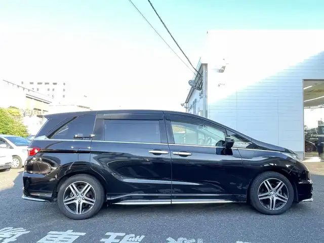 ホンダ オデッセイ アブソルート アドバンス 長崎県 2015(平27)年 14.7万km クリスタルブラックパール ワンオーナー車/メーカーインターナビ/（フルセグ、CD、DVD、AM、FM、BTオーディオ）/バックカメラ/全周囲カメラ/プッシュスタート/WAC/アダプティブクルーズコントロール/パドルシフト/レーンキープアシスト/ステアリングリモコン/オートライト/両側パワースライドドア/ビルトインETC/ハーフレザー/D席パワーシート/オールオートパワーウィンドウ/電格ウィンカーミラー/2列目ドアサンシェード/フリップダウンモニター/衝突軽減システム/横滑り防止/アイドリングストップ/路外逸脱抑制システム/Wエアバッグ/カーテンエアバッグ/ABS/ナビ取扱説明書/取扱説明書/保証書/スペアキー×１