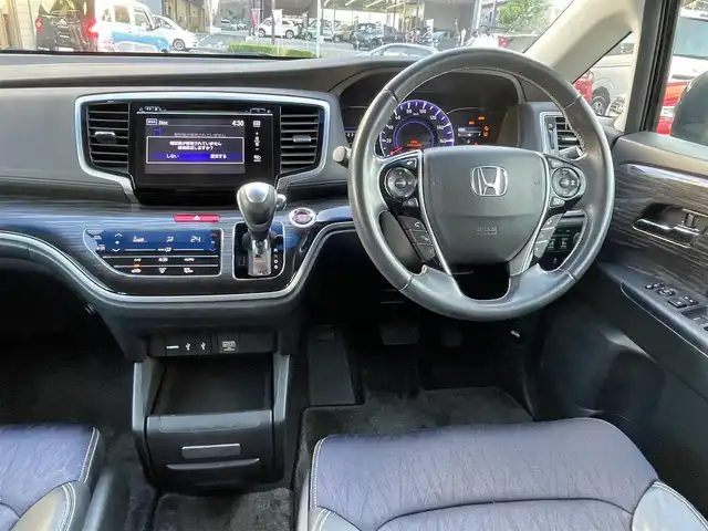 ホンダ オデッセイ アブソルート アドバンス 長崎県 2015(平27)年 14.7万km クリスタルブラックパール ワンオーナー車/メーカーインターナビ/（フルセグ、CD、DVD、AM、FM、BTオーディオ）/バックカメラ/全周囲カメラ/プッシュスタート/WAC/アダプティブクルーズコントロール/パドルシフト/レーンキープアシスト/ステアリングリモコン/オートライト/両側パワースライドドア/ビルトインETC/ハーフレザー/D席パワーシート/オールオートパワーウィンドウ/電格ウィンカーミラー/2列目ドアサンシェード/フリップダウンモニター/衝突軽減システム/横滑り防止/アイドリングストップ/路外逸脱抑制システム/Wエアバッグ/カーテンエアバッグ/ABS/ナビ取扱説明書/取扱説明書/保証書/スペアキー×１