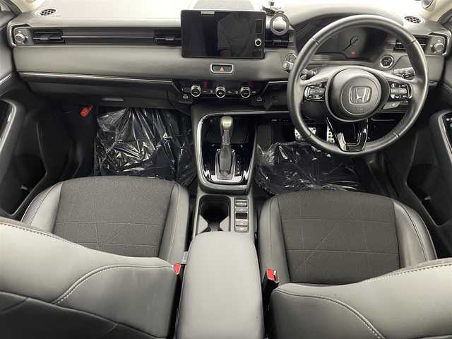 ホンダ ヴェゼル ハイブリッド e:HEV Z 埼玉県 2024(令6)年 3万km プラチナホワイトパール 純正９型ナビ　全方位カメラ　プレミアムサウンド　BSM　衝突軽減　ＥＴＣ　温シート　レーダークルーズコントロール　アダプティブＬＥＤヘッドライト　ビルトインＥＴＣ　スペアキー１本　前後ドラレコ　ハーフレザー　ダウンヒルアシスト　禁煙