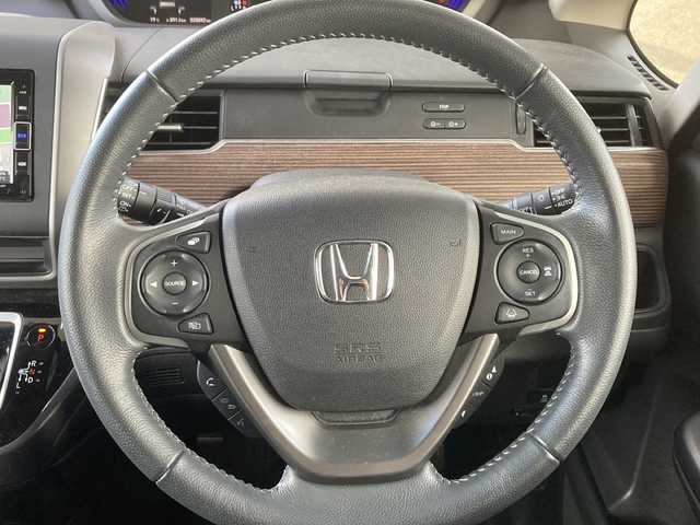 ホンダ フリード ハイブリット クロスター ホンダセンシング 東京都 2021(令3)年 2.1万km スーパープラチナグレーメタリック ワンオーナー/純正メモリナビ/【フルセグ・DVD再生可・CD・Bluetooth】/バックカメラ/ビルトインETC/両側パワースライドドア/ホンダセンシング/【衝突軽減ブレーキ・前後誤発進抑制機能・歩行者事故逓減ステアリング・アダプティブクルーズコントロール・車線維持支援システム・路外逸脱抑制機能・先行車発進お知らせ機能・標識認識機能】/社外AW付スタッドレスタイヤ４本積み込み/電動格納ミラー/プッシュスタート/スマートキー/スペアキーあり/ウィンカーミラー/ステアリングスイッチ/ECON/純正フロアマット/新車保証書/取扱説明書