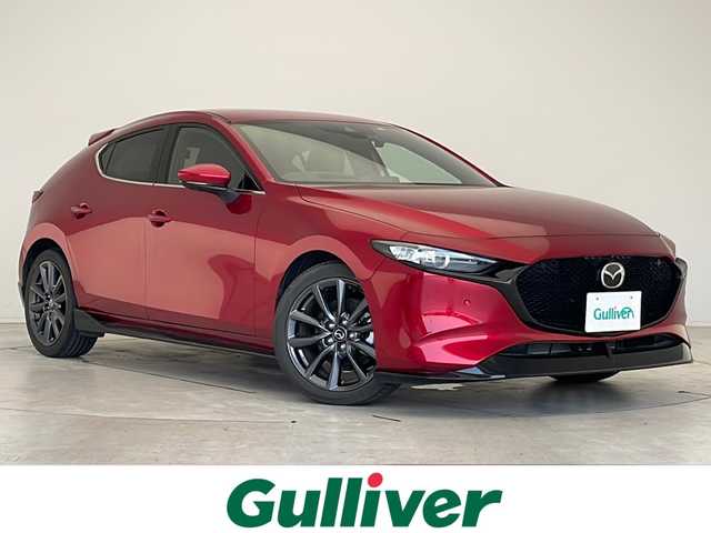 マツダ マツダ３ファストバック 15S ツーリング 愛知県 2022(令4)年 1.6万km ソウルレッドクリスタルM 衝突軽減システム/純正SDナビ/全方位カメラ/レーダークルーズコントロール/フルセグ/CD/DVD/Bluetooth/バックカメラ/ヘッドアップディスプレイ/コーナーセンサー/純正アルミホイール/ブラインドスポットモニター/LEDヘッドライト/オートマチックハイビーム/ドライブレコーダー/ETC/ステアリングスイッチ/スマートキー/プッシュスタート