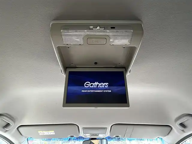 ホンダ ステップワゴン G ホンダセンシング 岡山県 2016(平28)年 12.9万km ホワイトオーキッドパール 純正7型ナビ　VXM-175VFi/フルセグTV、CD、DVD、Bluetooth、AM、FM/バックカメラ/純正フリップダウンモニター/片側パワースライドドア/わくわくゲート/ホンダセンシング/・衝突軽減ブレーキ/・アダブティブクルーズコントロール/・車線維持支援システム/・路外逸脱抑制機能/・誤発進抑制機能/・先行車発進お知らせ機能/・標識認識機能/ビルトインETC