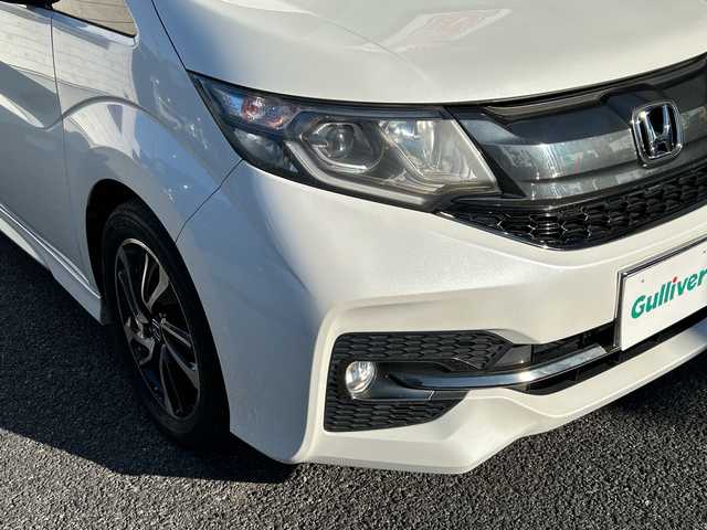 ホンダ ステップワゴン スパーダ クールスピリット 埼玉県 2017(平29)年 10.9万km ホワイトオーキッドパール 純正ナビ　/フルセグ/DVD/CD/BT/USB/HDMI/ビルトインＥＴＣ　/両側パワースライドドア　/ＡＣＣ　/パドルシフト　/前席シートヒーター　/横滑り防止　/衝突軽減システム　/レーンキープアシスト　/アイドリングストップ/後席テーブル/スマートキー２本　/保証書　/取扱説明書