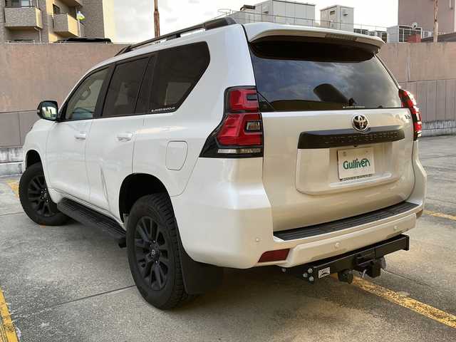 トヨタ ランドクルーザー プラド TX Lパッケージ マットブラED 広島県 2023(令5)年 7.8万km ホワイトパールクリスタルシャイン 禁煙/純正9型ナビ/アラウンドビューモニター/レーダークルーズコントロール/シートベンチレーション/シートヒーター/サンルーフ/前後コーナーセンサー/社外デジタルインナーミラー/ブラインドスポットモニター/ルーフレール/ラジアルタイヤ4本