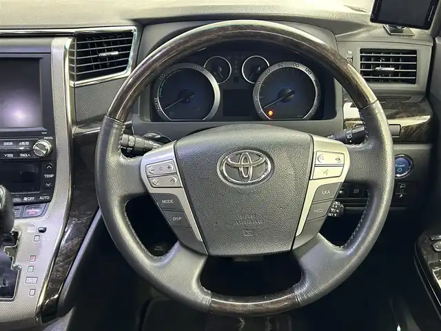 トヨタ ヴェルファイア ハイブリット ZR Gエディション 道央・札幌 2012(平24)年 11.1万km ホワイトパールクリスタルシャイン ・４WD/・純正8インチHDDナビ/　BT/CD/USB/HDD/フルセグ/・純正11インチフリップダウン/・純正ビルトインETC/・バックカメラ/・レーダークルーズコントロール/・衝突軽減ブレーキ/・レーンキープアシスト/・横滑り防止/・両側パワースライドドア/・電動リアゲート/・サンルーフ/・前席シートヒーター/・前席パワーシート/・社外フロアマット/・純正サマー17インチAW/・プッシュスタート/・スマートキー/・オートライト/・フロントフォグライト/・取扱説明書/・保証書