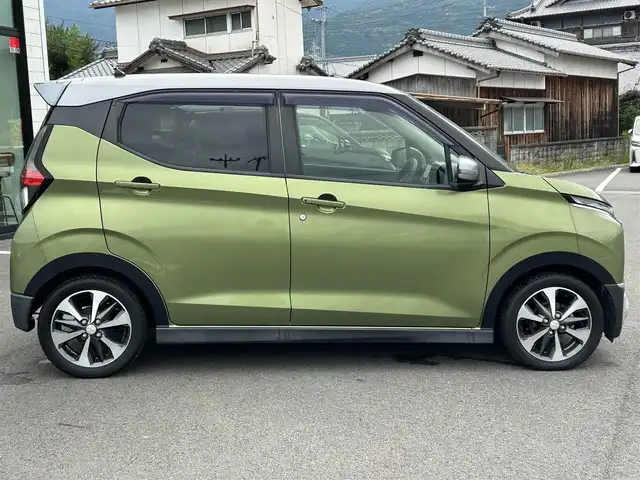 三菱 ｅＫクロス G 愛媛県 2019(令1)年 1.9万km オリーブグリーン チタニウムグレーメタリック/オリ-ブグリーン(U17F28)/e-Assist/KENWOOD7型ナビ/KENWOODツイーター/衝突被害軽減装置/車線逸脱防止装置/オートマチックハイビーム/アイドリングストップ/クリアランスソナー/LEDヘッドライト/前席シートヒーター/電格ミラー/ステアリングリモコン/ヘッドライトレベライザー/ドアバイザー/現状サマー(純正AW)(165/55/R15)/TOYO NANOENERGY/禁煙車