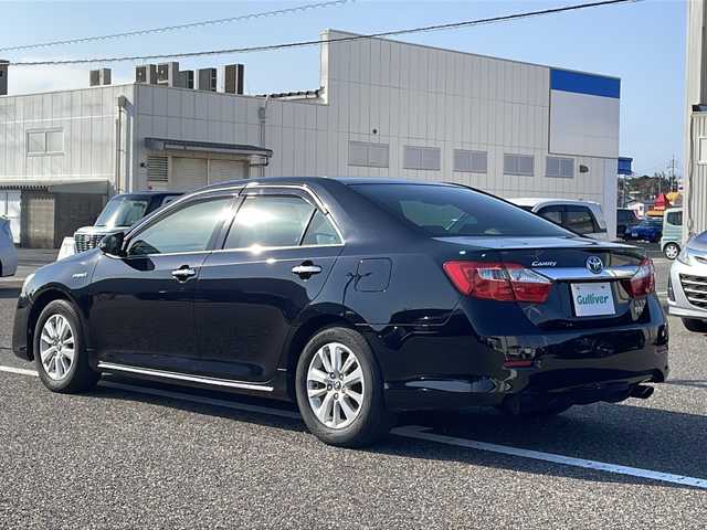 トヨタ カムリ ハイブリット Gパッケージ 島根県 2013(平25)年 12.9万km アティチュードブラックマイカ 社外ナビ（CN-H510WD）/フルセグTV/Bluetooth接続/リアモニター/パワーシートD席/クルーズコントロール/プッシュスタート/スタッドレスタイヤ付きアルミホイール/フォグライト/スペアキー