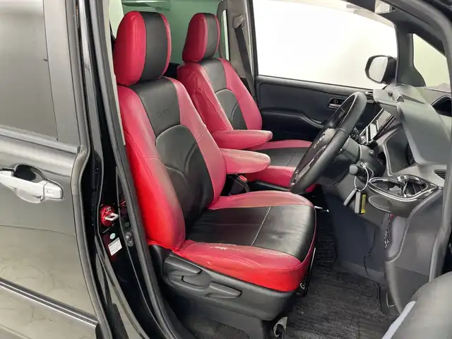トヨタ ヴォクシー ZS 愛知県 2014(平26)年 10.6万km ブラック 純正7インチナビ/（CD/DVD/Bluetooth/ワンセグTV）/フリップダウンモニター/バックカメラ/シルクブレイズエアロ/ETC/ドライブレコーダー/両側パワースライドドア/18インチアルミホイール/社外シートカバー/プッシュスタート/スマートキー/オートエアコン/オートライト
