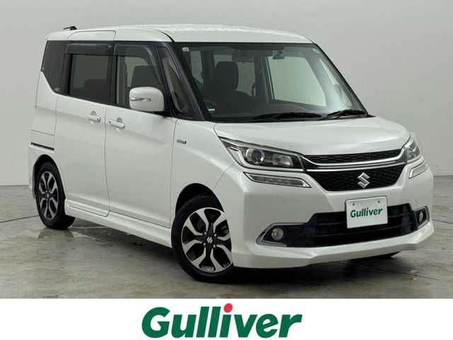 スズキ ソリオ バンディット HV MV Dカメラ ブレーキS 福岡県 2017(平29)年 1.4万km ピュアホワイトP 社外ナビ（フルセグＴＶ）　/バックカメラ　/前後ドライブレコーダー　/レーダー探知機　/クルーズコントロール　/衝突軽減ブレーキ　/レーンキープ　/シートヒーター　/両側電動スライドドア　/純正１５インチＡＷ　ＬＥＤ