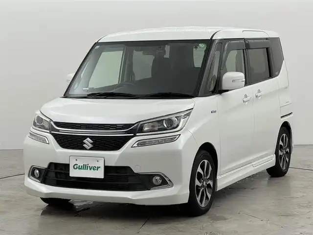 スズキ ソリオ バンディット HV MV Dカメラ ブレーキS 福岡県 2017(平29)年 1.4万km ピュアホワイトP 社外ナビ（フルセグＴＶ）　/バックカメラ　/前後ドライブレコーダー　/レーダー探知機　/クルーズコントロール　/衝突軽減ブレーキ　/レーンキープ　/シートヒーター　/両側電動スライドドア　/純正１５インチＡＷ　ＬＥＤ