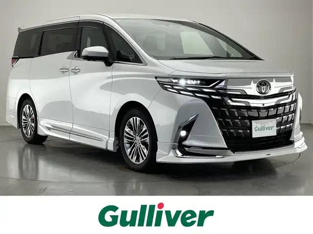 トヨタ アルファード Z 愛知県 2024(令6)年 1.8万km プラチナホワイトパールマイカ 純正１４型ナビ　独立ムーンルーフ　モデリスタエアロ　モデリスタマフラー　ユニバーサルステップ　デジタルインナーミラー　黒革　シートヒーター　前後ドラレコ　セーフティセンス　衝突軽減　追従クルコン　ＢＳＭ　ワイヤレス充電　ナノイーXエアコン　パワーバックドア　両側パワースライドドア　LEDオートライト　フォグランプ　コーナーセンサー　オットマン　ETC２．０　ステアリングヒーター　シートベンチレーション　コーナーセンサー　保証書　取説　ワンオーナー