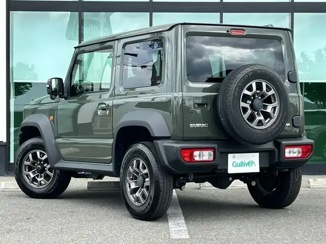 スズキ ジムニー シエラ JC 和歌山県 2023(令5)年 1.6万km ジャングルグリーン 社外7インチディスプレイオーディオ/（BT/CD/DVD)/衝突軽減ブレーキ/レーンキープ/クルーズコントロール/横滑り防止装置/前方ドライブレコーダー/前席シートヒーター/ヒルディルセントコントロール/背面タイヤ/電動格納ミラー/LEDヘッドライト/オートライト/オートマチックハイビーム