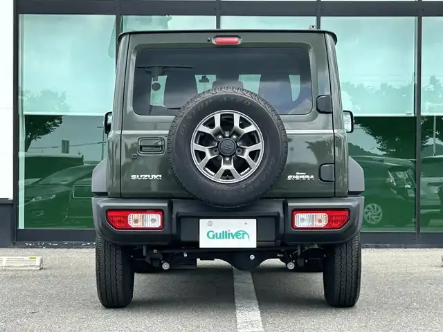 スズキ ジムニー シエラ JC 和歌山県 2023(令5)年 1.6万km ジャングルグリーン 社外7インチディスプレイオーディオ/（BT/CD/DVD)/衝突軽減ブレーキ/レーンキープ/クルーズコントロール/横滑り防止装置/前方ドライブレコーダー/前席シートヒーター/ヒルディルセントコントロール/背面タイヤ/電動格納ミラー/LEDヘッドライト/オートライト/オートマチックハイビーム