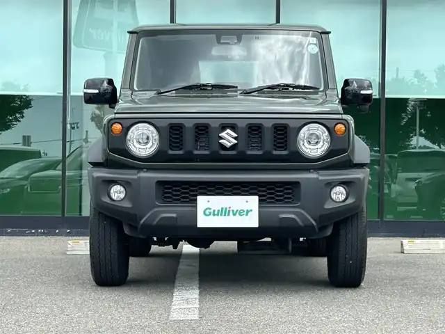 スズキ ジムニー シエラ JC 和歌山県 2023(令5)年 1.6万km ジャングルグリーン 社外7インチディスプレイオーディオ/（BT/CD/DVD)/衝突軽減ブレーキ/レーンキープ/クルーズコントロール/横滑り防止装置/前方ドライブレコーダー/前席シートヒーター/ヒルディルセントコントロール/背面タイヤ/電動格納ミラー/LEDヘッドライト/オートライト/オートマチックハイビーム