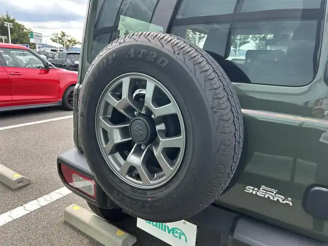 スズキ ジムニー シエラ JC 和歌山県 2023(令5)年 1.6万km ジャングルグリーン 社外7インチディスプレイオーディオ/（BT/CD/DVD)/衝突軽減ブレーキ/レーンキープ/クルーズコントロール/横滑り防止装置/前方ドライブレコーダー/前席シートヒーター/ヒルディルセントコントロール/背面タイヤ/電動格納ミラー/LEDヘッドライト/オートライト/オートマチックハイビーム