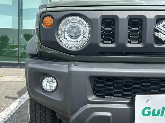 スズキ ジムニー シエラ JC 和歌山県 2023(令5)年 1.6万km ジャングルグリーン 社外7インチディスプレイオーディオ/（BT/CD/DVD)/衝突軽減ブレーキ/レーンキープ/クルーズコントロール/横滑り防止装置/前方ドライブレコーダー/前席シートヒーター/ヒルディルセントコントロール/背面タイヤ/電動格納ミラー/LEDヘッドライト/オートライト/オートマチックハイビーム