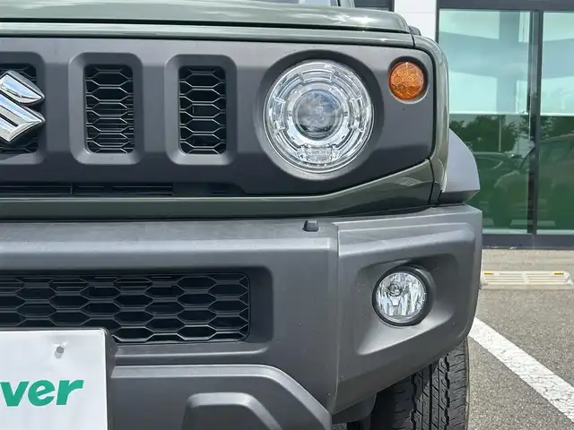 スズキ ジムニー シエラ JC 和歌山県 2023(令5)年 1.6万km ジャングルグリーン 社外7インチディスプレイオーディオ/（BT/CD/DVD)/衝突軽減ブレーキ/レーンキープ/クルーズコントロール/横滑り防止装置/前方ドライブレコーダー/前席シートヒーター/ヒルディルセントコントロール/背面タイヤ/電動格納ミラー/LEDヘッドライト/オートライト/オートマチックハイビーム