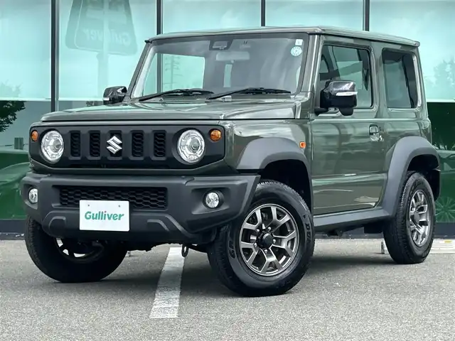 スズキ ジムニー シエラ JC 和歌山県 2023(令5)年 1.6万km ジャングルグリーン 社外7インチディスプレイオーディオ/（BT/CD/DVD)/衝突軽減ブレーキ/レーンキープ/クルーズコントロール/横滑り防止装置/前方ドライブレコーダー/前席シートヒーター/ヒルディルセントコントロール/背面タイヤ/電動格納ミラー/LEDヘッドライト/オートライト/オートマチックハイビーム