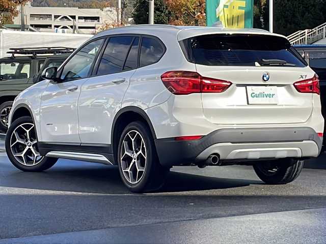 ＢＭＷ Ｘ１ xDrive 18d xライン 長野県 2017(平29)年 8.9万km ミネラルホワイト 禁煙車/4WD/ターボ/純正HDDナビ/・CD/DVD/Bluetooth/AUX/USB入力端子/バックカメラ/アイドリングストップ/ハーフレザーシート/純正AW/横滑り防止装置/コーナーセンサー/ダウンヒルアシストコントロール/ミラーインETC/ドライブレコーダー/LIMボタン(ドアロックボタン)/ブレーキホールド/ルーフレール/革巻きステアリング/ステアリングスイッチ/スマートキー/プッシュスタート/電動格納ミラー/カーテンエアバック