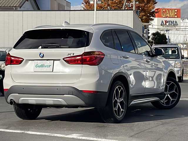 ＢＭＷ Ｘ１ xDrive 18d xライン 長野県 2017(平29)年 8.9万km ミネラルホワイト 禁煙車/4WD/ターボ/純正HDDナビ/・CD/DVD/Bluetooth/AUX/USB入力端子/バックカメラ/アイドリングストップ/ハーフレザーシート/純正AW/横滑り防止装置/コーナーセンサー/ダウンヒルアシストコントロール/ミラーインETC/ドライブレコーダー/LIMボタン(ドアロックボタン)/ブレーキホールド/ルーフレール/革巻きステアリング/ステアリングスイッチ/スマートキー/プッシュスタート/電動格納ミラー/カーテンエアバック