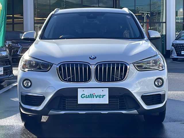 ＢＭＷ Ｘ１ xDrive 18d xライン 長野県 2017(平29)年 8.9万km ミネラルホワイト 禁煙車/4WD/ターボ/純正HDDナビ/・CD/DVD/Bluetooth/AUX/USB入力端子/バックカメラ/アイドリングストップ/ハーフレザーシート/純正AW/横滑り防止装置/コーナーセンサー/ダウンヒルアシストコントロール/ミラーインETC/ドライブレコーダー/LIMボタン(ドアロックボタン)/ブレーキホールド/ルーフレール/革巻きステアリング/ステアリングスイッチ/スマートキー/プッシュスタート/電動格納ミラー/カーテンエアバック