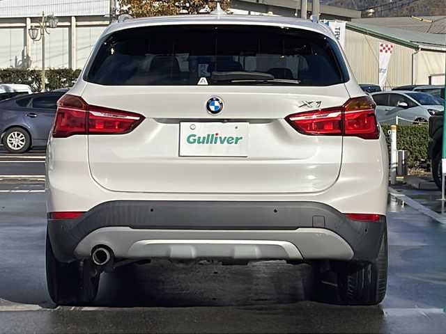 ＢＭＷ Ｘ１ xDrive 18d xライン 長野県 2017(平29)年 8.9万km ミネラルホワイト 禁煙車/4WD/ターボ/純正HDDナビ/・CD/DVD/Bluetooth/AUX/USB入力端子/バックカメラ/アイドリングストップ/ハーフレザーシート/純正AW/横滑り防止装置/コーナーセンサー/ダウンヒルアシストコントロール/ミラーインETC/ドライブレコーダー/LIMボタン(ドアロックボタン)/ブレーキホールド/ルーフレール/革巻きステアリング/ステアリングスイッチ/スマートキー/プッシュスタート/電動格納ミラー/カーテンエアバック