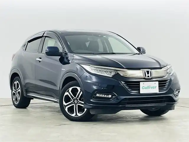 ホンダ ヴェゼル ハイブリッド Z ホンダセンシング 福島県 2018(平30)年 6.8万km ミッドナイトブルービームM ホンダセンシング/・衝突軽減ブレーキシステム/・路外逸脱抑制機能/・アダプティブクルーズコントロール/社外ナビゲーション/・型式：CN-E320D/・BluetoothTVCD/・バックカメラ/・ETC/前方ドライブレコーダー/プッシュスタート/・スマートキー/・スペアキー/電子パーキング/・オートホールド/革巻きステアリング/・ステアリングスイッチ/電動格納ミラー/ドアバイザー/純正フロアマット/LEDライト/・フォグライト