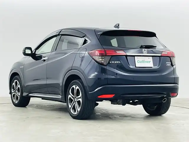 ホンダ ヴェゼル ハイブリッド Z ホンダセンシング 福島県 2018(平30)年 6.8万km ミッドナイトブルービームM ホンダセンシング/・衝突軽減ブレーキシステム/・路外逸脱抑制機能/・アダプティブクルーズコントロール/社外ナビゲーション/・型式：CN-E320D/・BluetoothTVCD/・バックカメラ/・ETC/前方ドライブレコーダー/プッシュスタート/・スマートキー/・スペアキー/電子パーキング/・オートホールド/革巻きステアリング/・ステアリングスイッチ/電動格納ミラー/ドアバイザー/純正フロアマット/LEDライト/・フォグライト