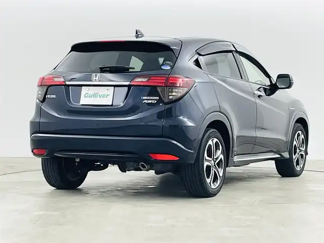 ホンダ ヴェゼル ハイブリッド Z ホンダセンシング 福島県 2018(平30)年 6.8万km ミッドナイトブルービームM ホンダセンシング/・衝突軽減ブレーキシステム/・路外逸脱抑制機能/・アダプティブクルーズコントロール/社外ナビゲーション/・型式：CN-E320D/・BluetoothTVCD/・バックカメラ/・ETC/前方ドライブレコーダー/プッシュスタート/・スマートキー/・スペアキー/電子パーキング/・オートホールド/革巻きステアリング/・ステアリングスイッチ/電動格納ミラー/ドアバイザー/純正フロアマット/LEDライト/・フォグライト