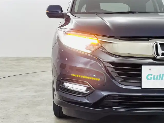 ホンダ ヴェゼル ハイブリッド Z ホンダセンシング 福島県 2018(平30)年 6.8万km ミッドナイトブルービームM ホンダセンシング/・衝突軽減ブレーキシステム/・路外逸脱抑制機能/・アダプティブクルーズコントロール/社外ナビゲーション/・型式：CN-E320D/・BluetoothTVCD/・バックカメラ/・ETC/前方ドライブレコーダー/プッシュスタート/・スマートキー/・スペアキー/電子パーキング/・オートホールド/革巻きステアリング/・ステアリングスイッチ/電動格納ミラー/ドアバイザー/純正フロアマット/LEDライト/・フォグライト
