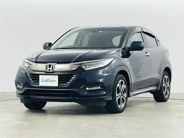 ホンダ ヴェゼル ハイブリッド Z ホンダセンシング 福島県 2018(平30)年 6.8万km ミッドナイトブルービームM ホンダセンシング/・衝突軽減ブレーキシステム/・路外逸脱抑制機能/・アダプティブクルーズコントロール/社外ナビゲーション/・型式：CN-E320D/・BluetoothTVCD/・バックカメラ/・ETC/前方ドライブレコーダー/プッシュスタート/・スマートキー/・スペアキー/電子パーキング/・オートホールド/革巻きステアリング/・ステアリングスイッチ/電動格納ミラー/ドアバイザー/純正フロアマット/LEDライト/・フォグライト