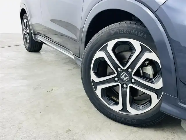 ホンダ ヴェゼル ハイブリッド Z ホンダセンシング 福島県 2018(平30)年 6.8万km ミッドナイトブルービームM ホンダセンシング/・衝突軽減ブレーキシステム/・路外逸脱抑制機能/・アダプティブクルーズコントロール/社外ナビゲーション/・型式：CN-E320D/・BluetoothTVCD/・バックカメラ/・ETC/前方ドライブレコーダー/プッシュスタート/・スマートキー/・スペアキー/電子パーキング/・オートホールド/革巻きステアリング/・ステアリングスイッチ/電動格納ミラー/ドアバイザー/純正フロアマット/LEDライト/・フォグライト