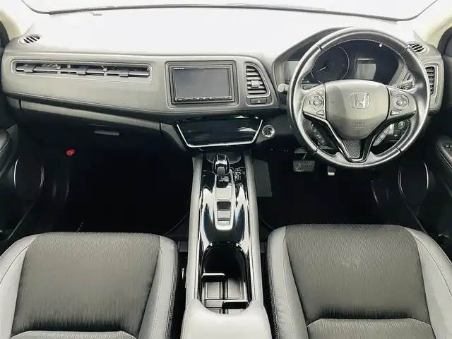 ホンダ ヴェゼル ハイブリッド Z ホンダセンシング 福島県 2018(平30)年 6.8万km ミッドナイトブルービームM ホンダセンシング/・衝突軽減ブレーキシステム/・路外逸脱抑制機能/・アダプティブクルーズコントロール/社外ナビゲーション/・型式：CN-E320D/・BluetoothTVCD/・バックカメラ/・ETC/前方ドライブレコーダー/プッシュスタート/・スマートキー/・スペアキー/電子パーキング/・オートホールド/革巻きステアリング/・ステアリングスイッチ/電動格納ミラー/ドアバイザー/純正フロアマット/LEDライト/・フォグライト