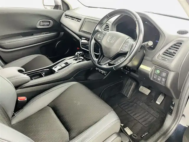 ホンダ ヴェゼル ハイブリッド Z ホンダセンシング 福島県 2018(平30)年 6.8万km ミッドナイトブルービームM ホンダセンシング/・衝突軽減ブレーキシステム/・路外逸脱抑制機能/・アダプティブクルーズコントロール/社外ナビゲーション/・型式：CN-E320D/・BluetoothTVCD/・バックカメラ/・ETC/前方ドライブレコーダー/プッシュスタート/・スマートキー/・スペアキー/電子パーキング/・オートホールド/革巻きステアリング/・ステアリングスイッチ/電動格納ミラー/ドアバイザー/純正フロアマット/LEDライト/・フォグライト