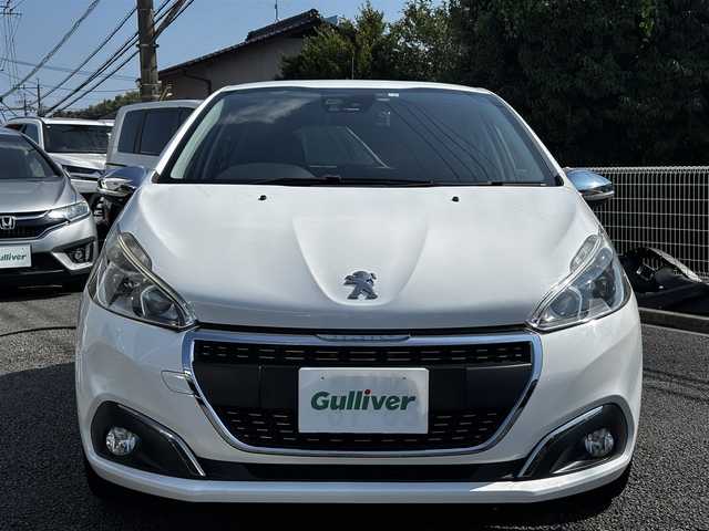 プジョー ２０８ アリュール 熊本県 2016(平28)年 9.9万km 白 純正ナビ/【ＡＭ／ＦＭ／ＵＳＢ／ＢＴ】/バックカメラ/パーキングセンサー/ＥＴＣ/前方ドライブレコーダー/純正16インチアルミホイール/ＨＩＤヘッドライト/オートライト/フォグランプ/ヘッドライトレベライザー/純正フロアマット/純正ドアバイザー/取扱説明書/スペアキー