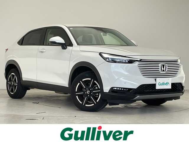 ホンダ ヴェゼル G 愛知県 2023(令5)年 2.8万km プラチナホワイトパール 純正9型ディズプレイオーディオナビ/レーダークルーズコントロール/バックカメラ/コーナーセンサー/純正アルミホイール/ETC2.0/レーンキープアシスト/ダウンヒルアシストコントロール/オートマチックハイビーム/ワイヤレス充電器/ドライブレコーダー/衝突軽減システム/Bluetooth/フルセグ/ステアリングスイッチ/スマートキー/プッシュスタート